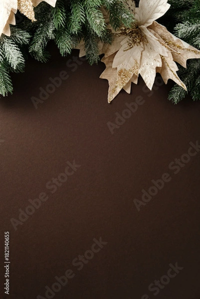 Obraz Vertical elegant Christmas background with frosted pine and gold glitter poinsettia along the top edge