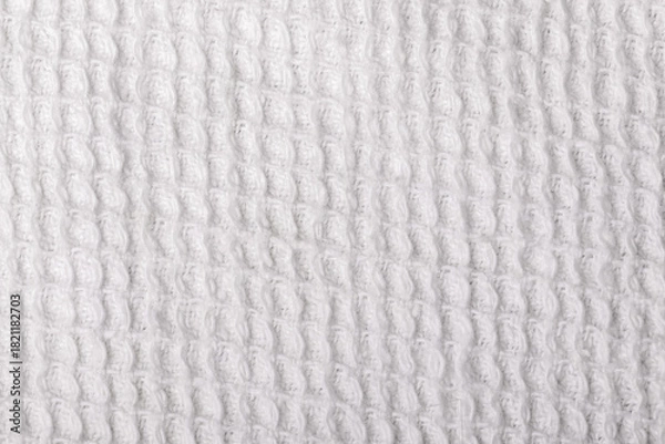 Obraz Close up of white waffle weave fabric texture, ideal for backgrounds, textile design, or product presentations.