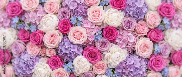 Obraz Vibrant floral background featuring a lush mix of roses in soft pink, purple, and white tones.
