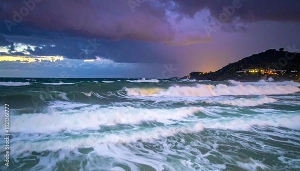 Fototapeta Dramatic seascape with powerful waves crashing under a dark, stormy sky at