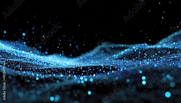 Fototapeta Abstract digital waves of shimmering blue particles against a stark black background