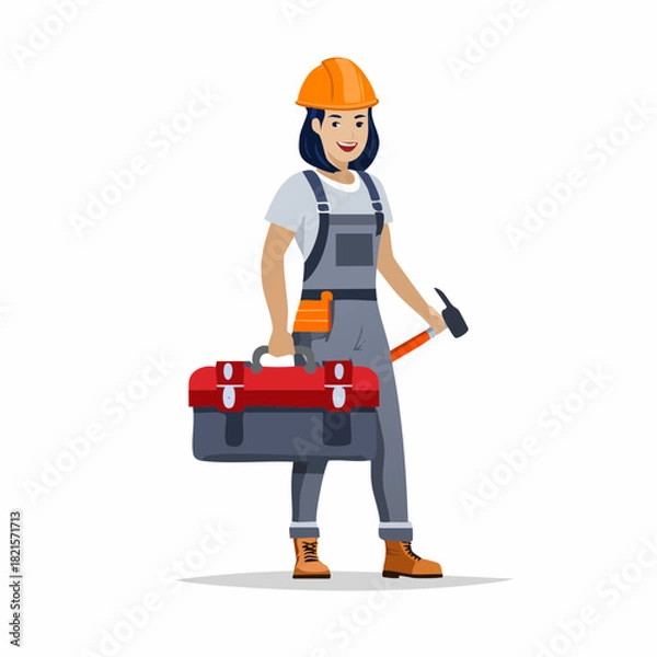 Fototapeta Smiling female construction worker carrying toolbox and hammer on construction site, ready to start repairs with a positive and confident attitude.