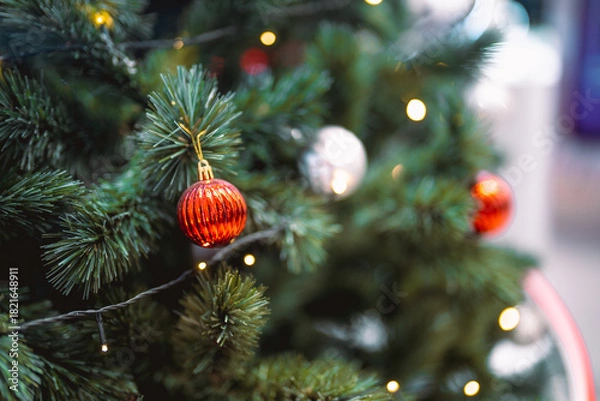 Obraz Closeup garland Christmas tree decoration,red,gold,silver ornament with bokeh background. Perfect holiday sales, winter celebration, festive seasonal promotions, marketing, shopping with copy space