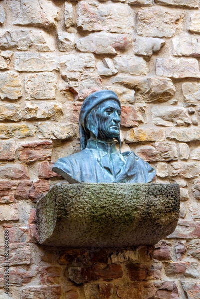 Obraz Bronze Bust Sculpture With Blue Patina Mounted on Weathered Stone Pedestal Against Rustic Brick Wall