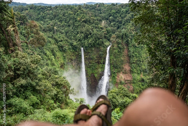 Obraz Person relaxing enjoying Tad fane waterfall view in laos