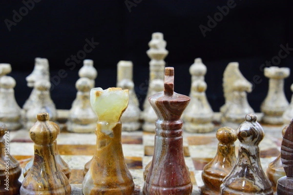 Obraz Alabaster chess pieces on board
