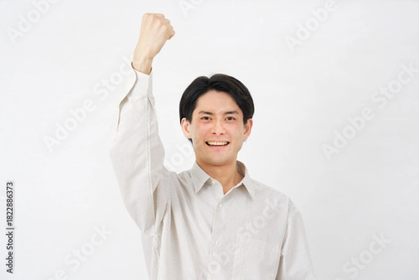 Obraz 男性　20代　ガッツポーズ　白背景