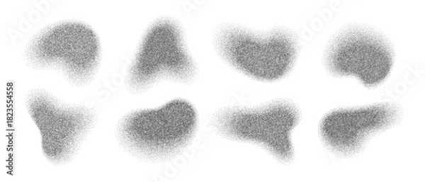 Fototapeta Stippled irregular shapes noise grain effect gradient texture set. Grainy halftone dots with noise textures and organic brush spray effects create abstract visual elements for contemporary artwork.