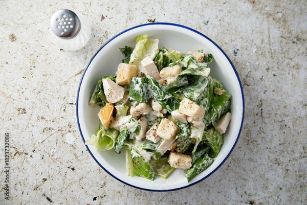 Fototapeta Caesar salad with chicken