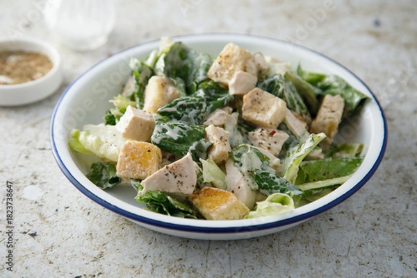 Fototapeta Caesar salad with chicken