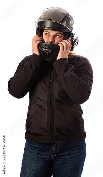 Obraz Adjusting her motocycle helmet