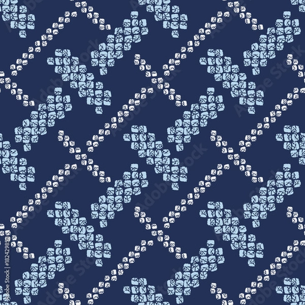 Fototapeta Shibori ornament. Weaving motif. Asian seamless pattern. Dark indigo background. Classic japanese dyeing technique. For wallpaper, web page background, surface textures.