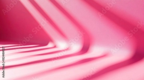 Fototapeta Abstract pink background with shadows from the rays of light on the wall.