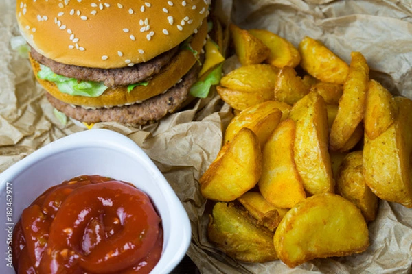 Fototapeta Fast food and a chilled glass of fresh light beer.