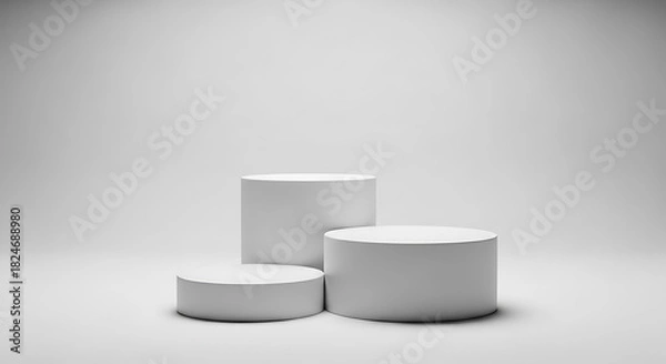 Fototapeta Minimalist white cylindrical product display pedestals on a clean background for mockups