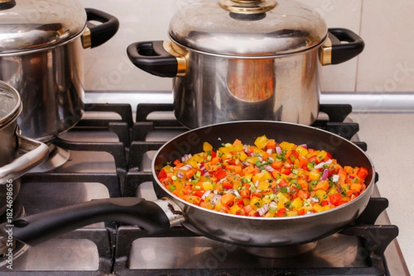 Obraz Mixed vegetables on a frying pan.