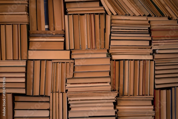 Obraz Stacked vintage books forming textured wall pattern