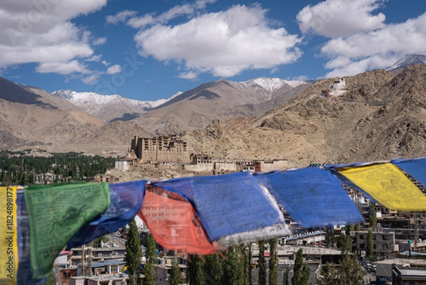 Obraz Leh, India - September 12, 2024: View of the city with Leh Palace and with snow capped mountains in the background