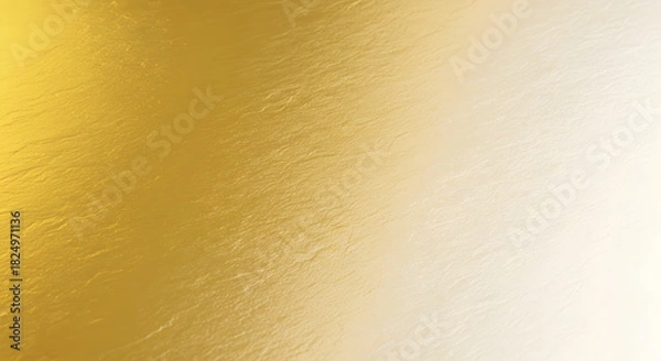 Fototapeta A luxurious golden metallic texture with a smooth gradient transition from rich gold to bright white, creating an elegant and abstract background for design