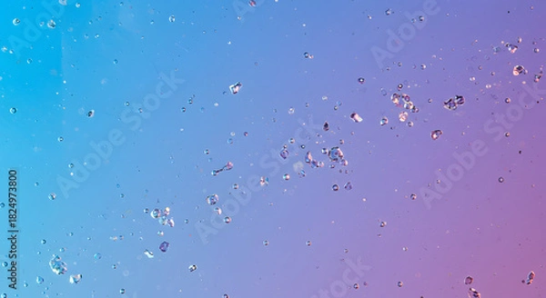 Fototapeta Refreshing abstract background with numerous small water droplets scattered across a vibrant blue and purple gradient, creating a dynamic texture