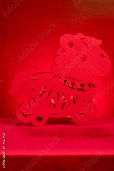 Fototapeta Chinese New Year of Horse mascot on red at vertical composition