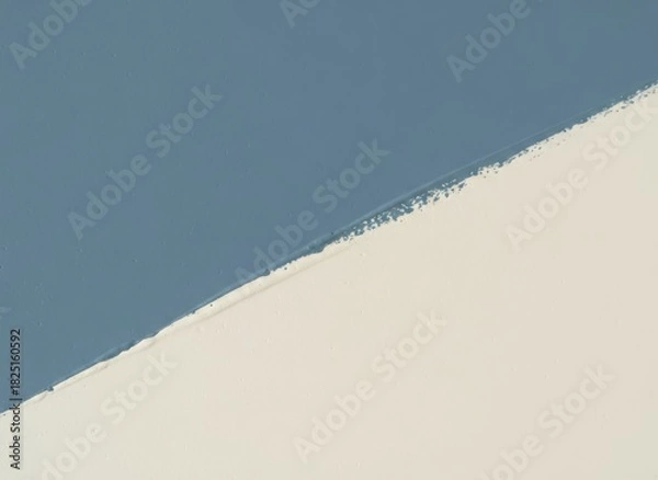 Fototapeta Wall painted blue and white creating diagonal line