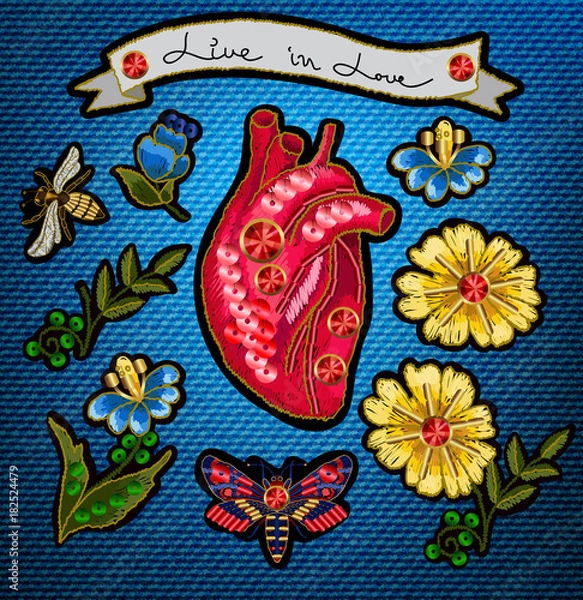 Obraz Embroidery in the form of heart with flowers and insects. Embroidered patch adorn sequins, beads and precious stones on jeans background.