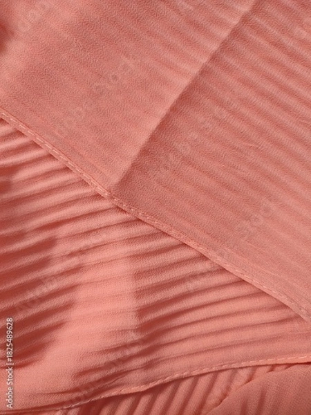 Fototapeta background and pattern of plain pink fabric with striped motif