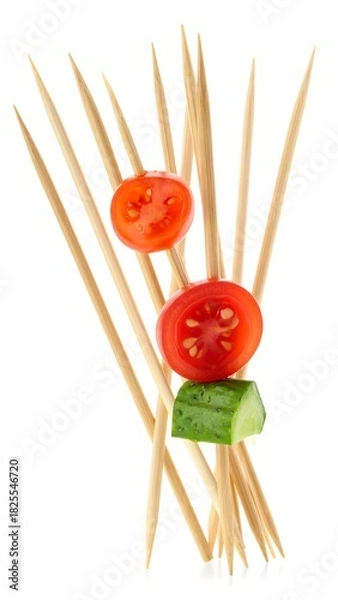 Fototapeta Skewered fresh vegetables on wooden toothpicks, isolated on white background