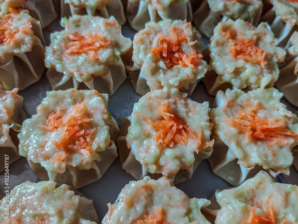 Obraz Fresh Dim Sum Filling with Wonton Wrappers and Carrot Topping