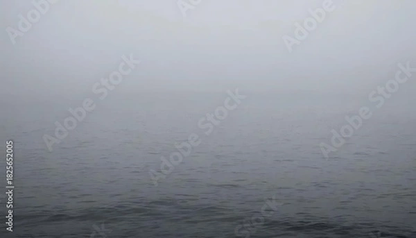 Fototapeta Vast Ocean Surface Blanketed by Serene Haze, Where the Mysterious Horizon Blurs Seamlessly into a Misty Sky, Evoking Calm and Tranquility