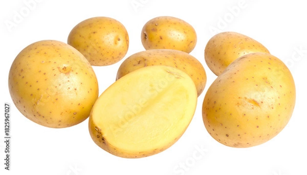 Fototapeta Close-up of fresh, raw, golden potatoes; one halved, arranged on a dark backdrop