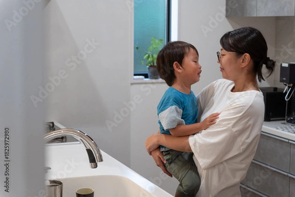 Obraz 子どもが泣いて家事ができないお母さん