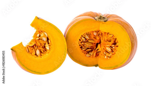 Fototapeta Close-up of a partially cut pumpkin and a slice revealing seeds and bright orange flesh