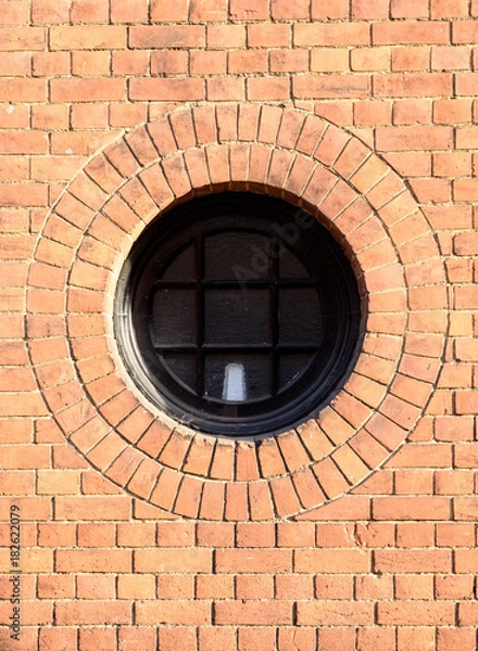 Obraz Round Window in Red Brick Wall