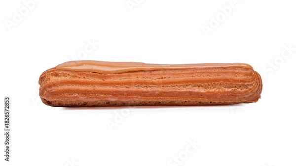Fototapeta An isolated, perfectly baked eclair pastry with a light brown choux dough shell is topped with smooth, white sugar glaze on a pure white background.