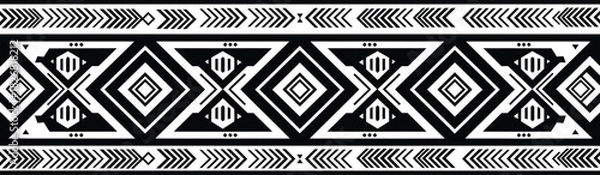 Fototapeta Seamless black and white vector border featuring bold geometric tribal and native american ethnic patterns for use in fabric, fashion, wallpaper, and abstract decoration.