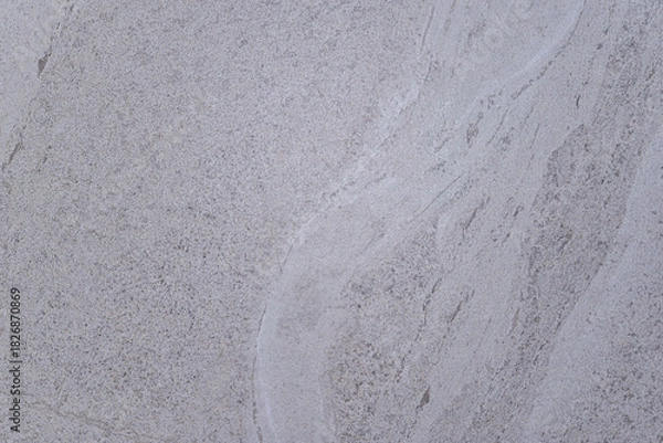 Obraz A grey stone wall with a white line. The wall is made of stone and has a white line on it