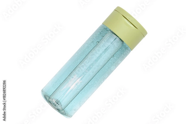 Fototapeta Blue makeup remover in a transparent container on a white background.