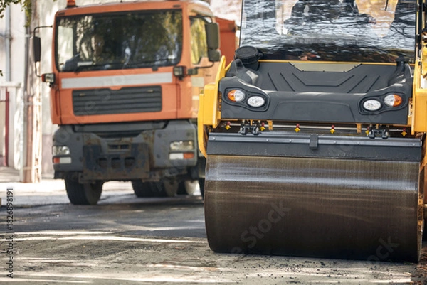 Obraz Public city street reconstruction with heavy machines.