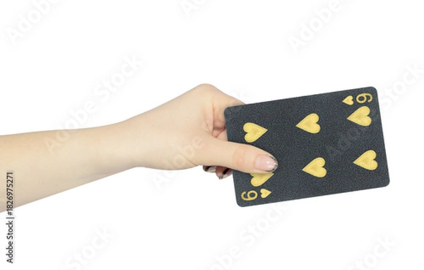 Obraz playing card hearts 6 in hand, outstretched hand with black playing card isolated from background