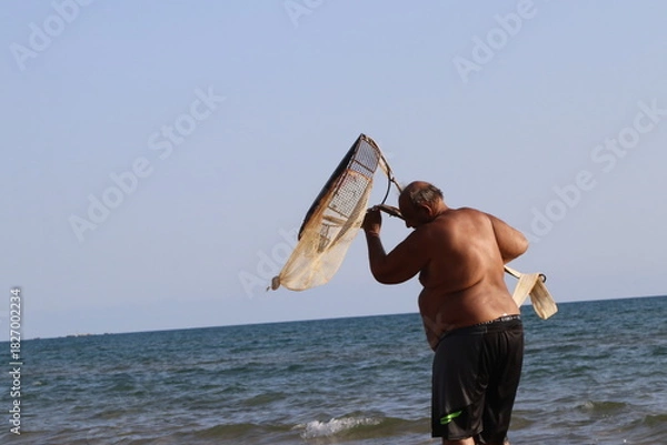 Obraz man with surfboard