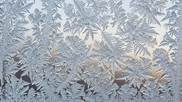 Obraz Stunning frost patterns creating intricate designs on a window pane, perfect for winter backgrounds or abstract design projects with a cool, icy aesthetic