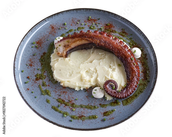 Obraz Grilled octopus tentacle with mashed potatoes on plate