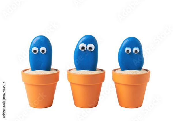 Fototapeta Three humorous handmade cerulean blue stone "cacti" with googly eyes in orange terracotta pots, on a bright white studio background with copy space. Concept of creative diy crafts