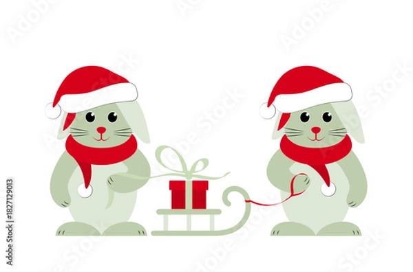Fototapeta bunnies with caps and scarfs and sledge with gift isolated on white background