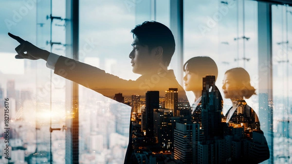 Fototapeta 朝日夕日の中の都市オフィスで進路を指し示すビジネスパートナーリーダーと従う従業員の選択した進む未来