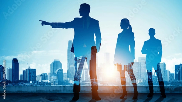 Fototapeta 朝日夕日の中の都市オフィスで進路を指し示すビジネスパートナーリーダーと従う従業員の選択した進む未来