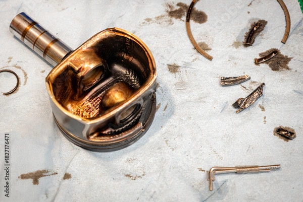 Obraz Broken engine piston, broken piston parts, engine damage and further repairs