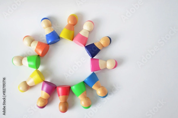 Obraz Diverse colorful wooden figures forming a community circle